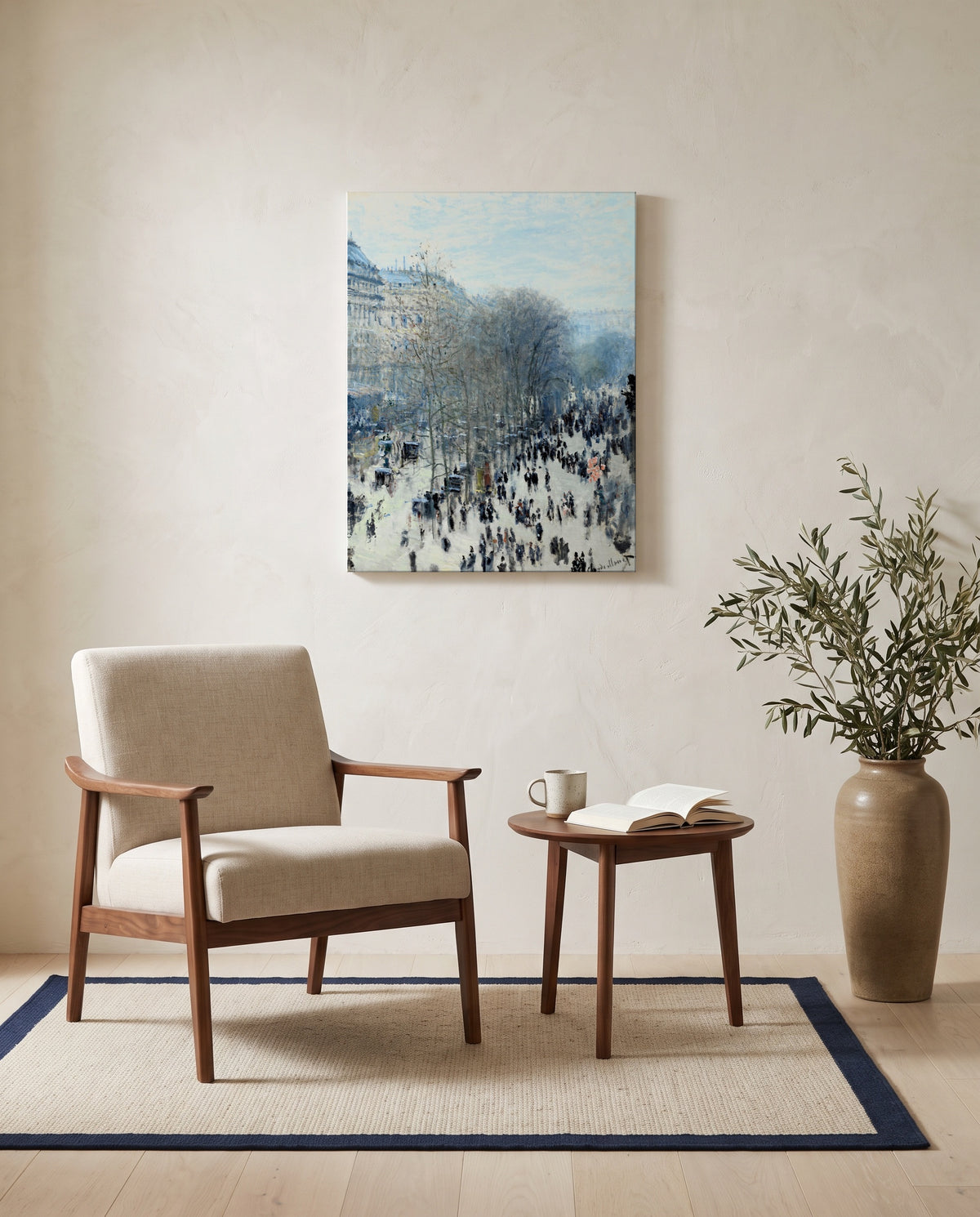 Boulevard des Capucines by Claude Monet as a stretched canvas above a linen lounge chair in a reading corner