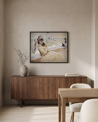 Camille on the Beach by Claude Monet in a black frame above a walnut sideboard in a dining room