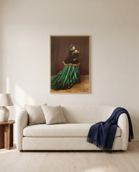 Camille by Claude Monet framed in natural oak above a cream sofa in a warm living room
