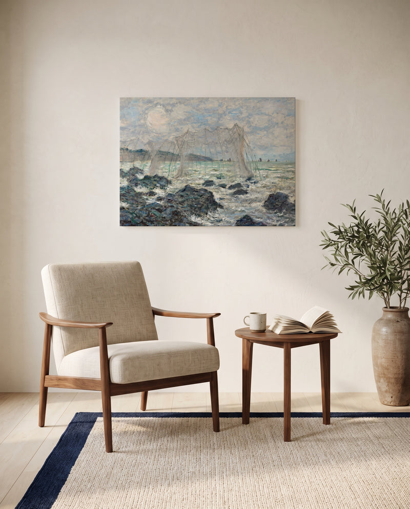 Fishing Nets at Pourville by Claude Monet as a stretched canvas above a linen lounge chair in a reading corner