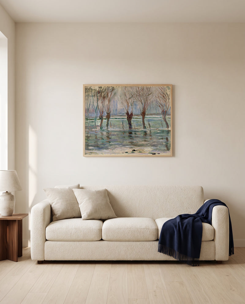 Flood Waters by Claude Monet framed in natural oak above a cream sofa in a warm living room