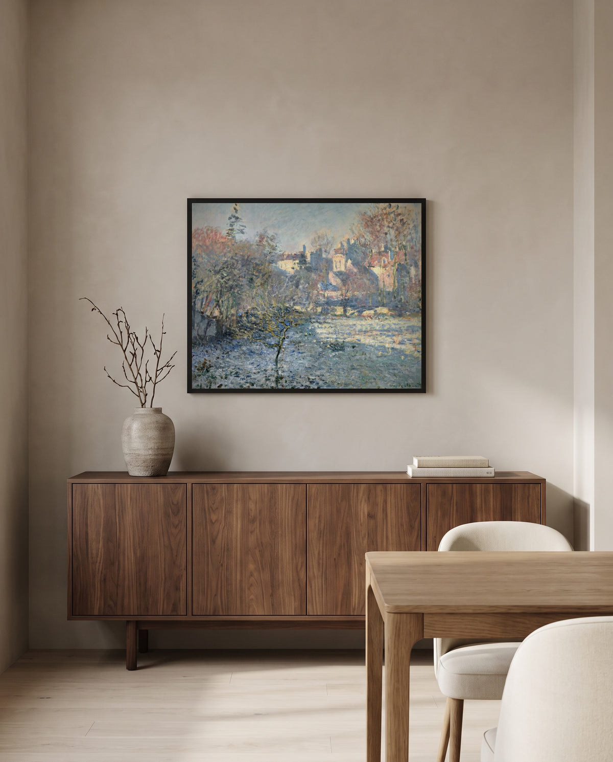 Frost, Argenteuil by Claude Monet in a black frame above a walnut sideboard in a dining room