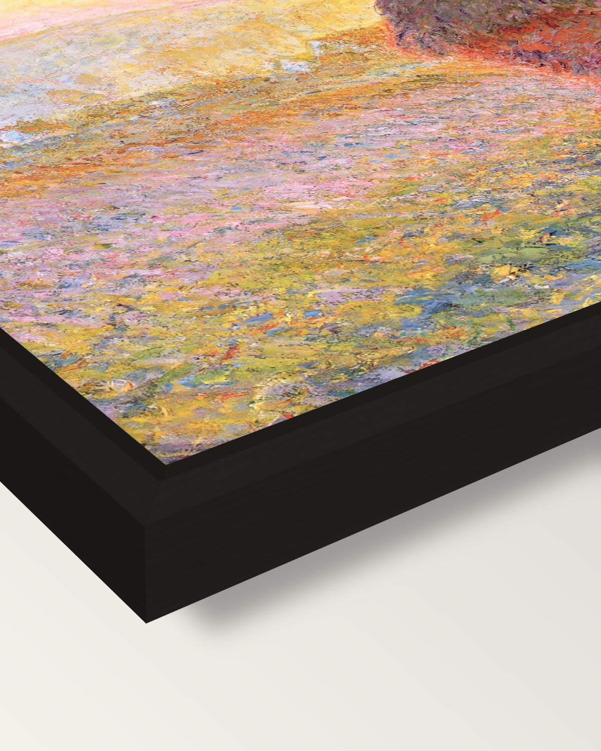 Grainstack (Sunset) by Claude Monet framed canvas, corner close-up: a black floating frame with a shadow gap round the canvas