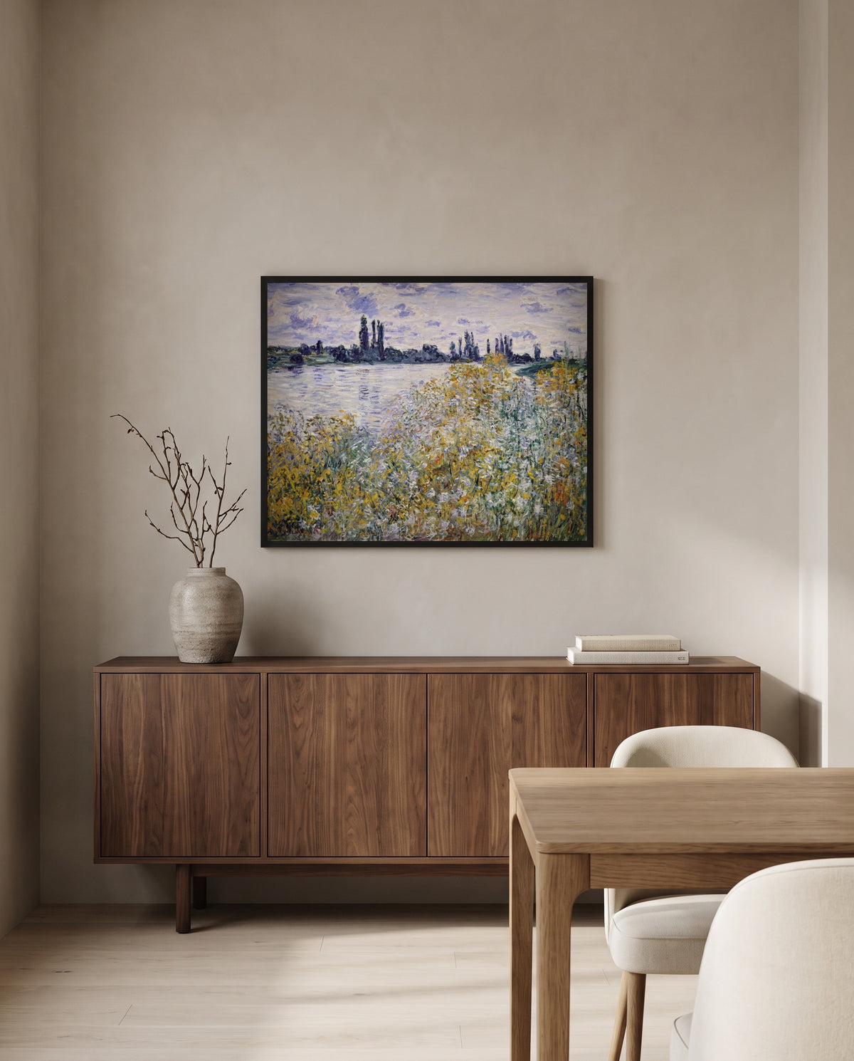 Île aux Fleurs, Vétheuil by Claude Monet in a black frame above a walnut sideboard in a dining room