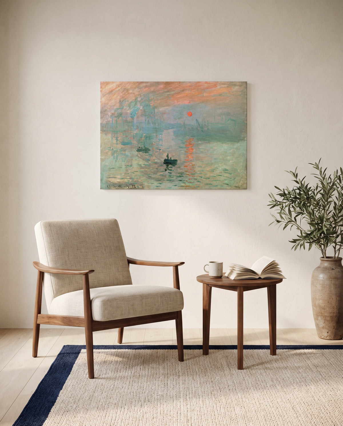 Impression, Sunrise by Claude Monet as a stretched canvas above a linen lounge chair in a reading corner