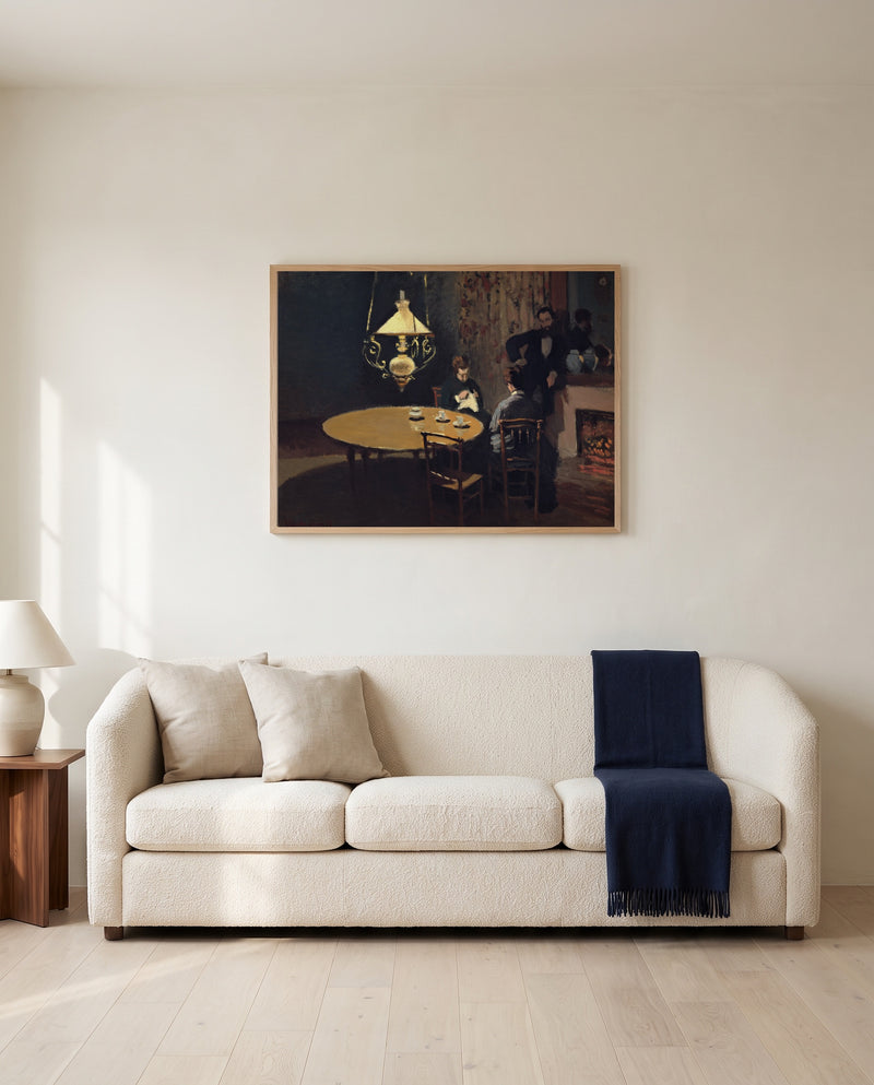 Interior, after Dinner by Claude Monet framed in natural oak above a cream sofa in a warm living room