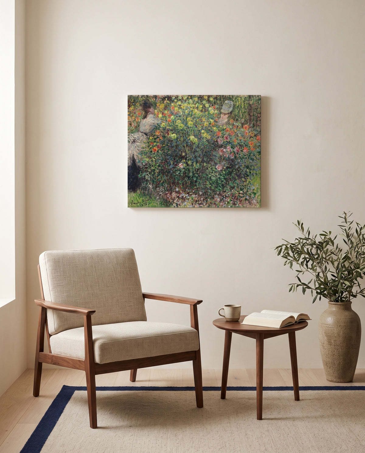 Women among the Flowers by Claude Monet as a stretched canvas above a linen lounge chair in a reading corner