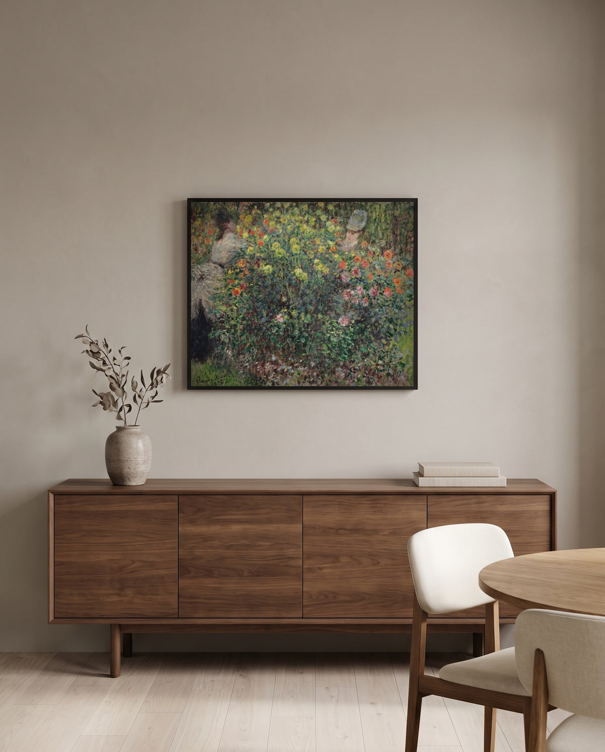 Women among the Flowers by Claude Monet in a black frame above a walnut sideboard in a dining room