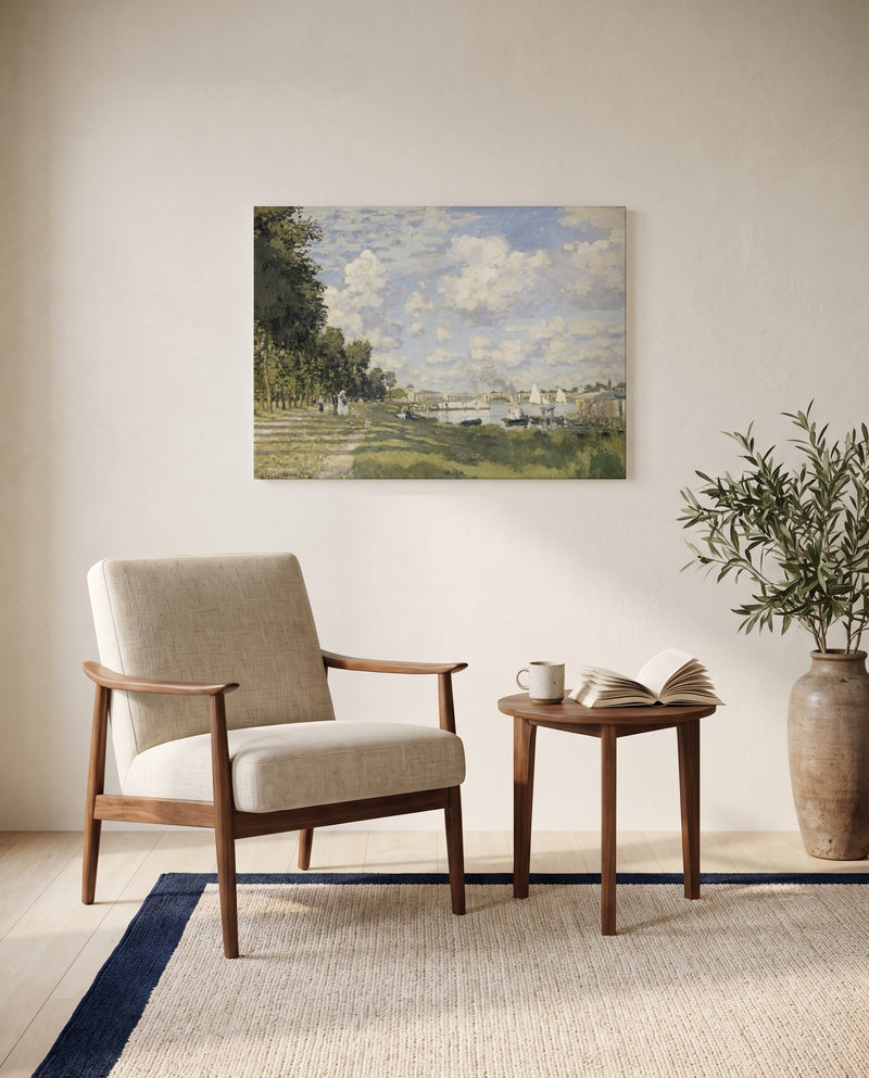 Le Bassin d’Argenteuil by Claude Monet as a stretched canvas above a linen lounge chair in a reading corner
