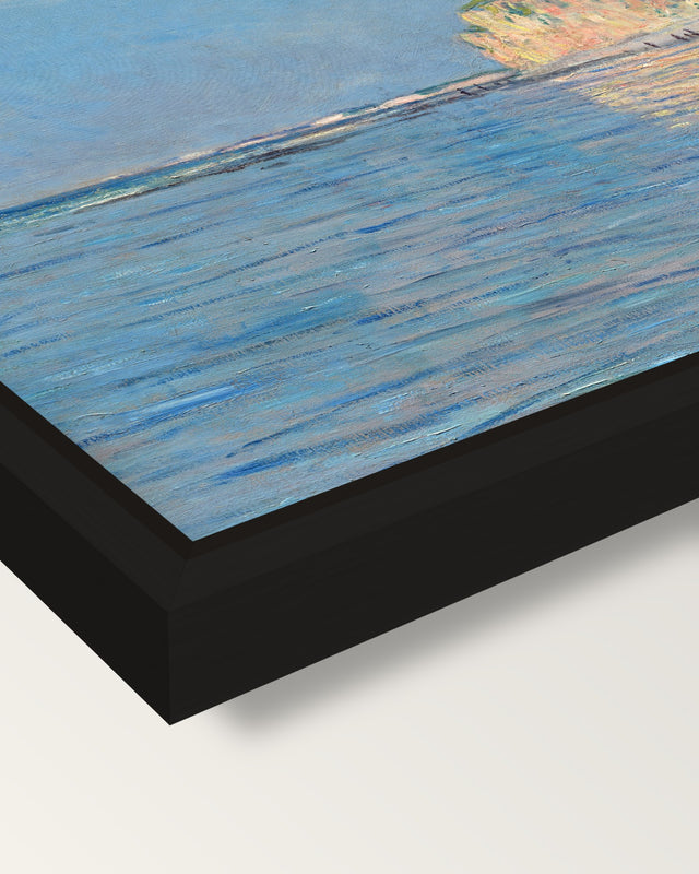 Low Tide at Pourville by Monet framed canvas, corner close-up: a black floating frame with a shadow gap round the canvas