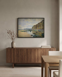 Low Tide at Varengeville by Claude Monet in a black frame above a walnut sideboard in a dining room