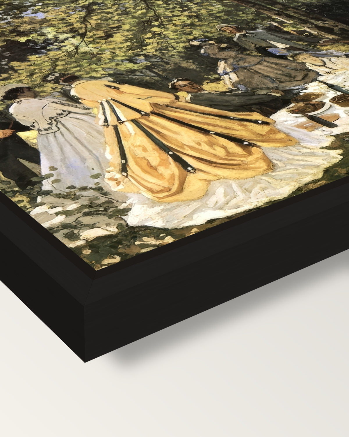 Luncheon on the Grass by Monet framed canvas, corner close-up: a black floating frame with a shadow gap round the canvas