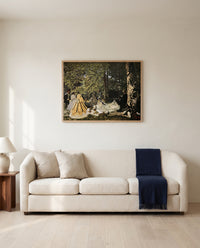 Luncheon on the Grass by Claude Monet framed in natural oak above a cream sofa in a warm living room