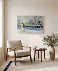 The Magpie by Claude Monet as a stretched canvas above a linen lounge chair in a reading corner
