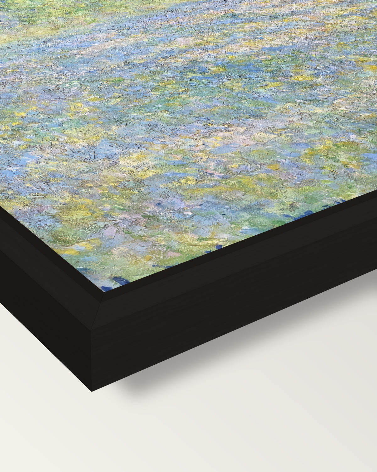 Meadow at Giverny by Claude Monet framed canvas, corner close-up: a black floating frame with a shadow gap round the canvas