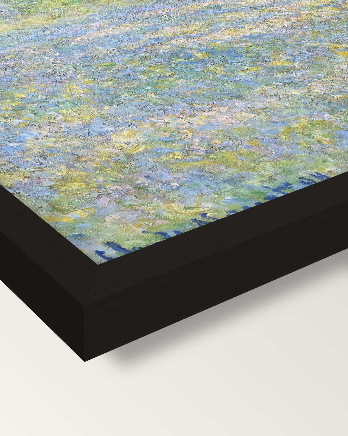Meadow at Giverny by Claude Monet framed print, corner close-up: black moulding, mitred, the print set just below its edge