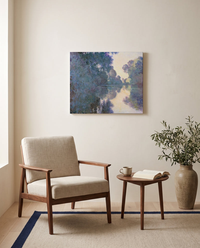 Morning on the Seine by Claude Monet as a stretched canvas above a linen lounge chair in a reading corner