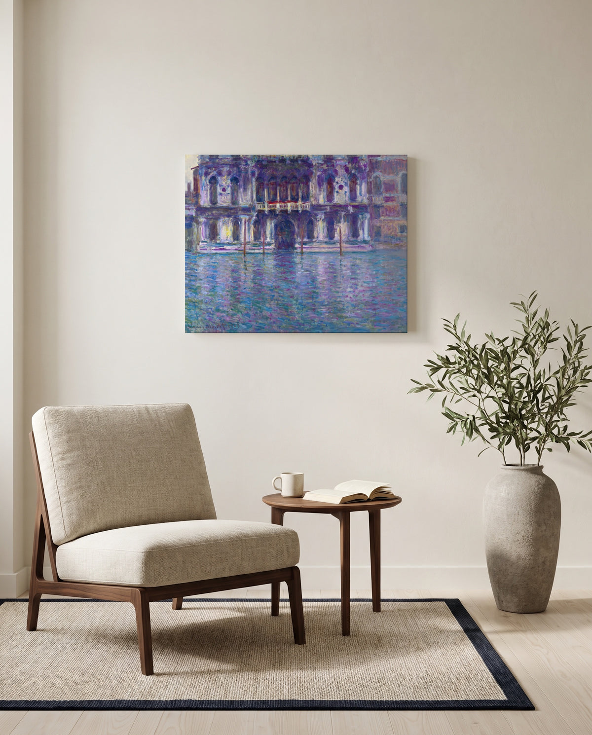 The Palazzo Contarini by Claude Monet as a stretched canvas above a linen lounge chair in a reading corner