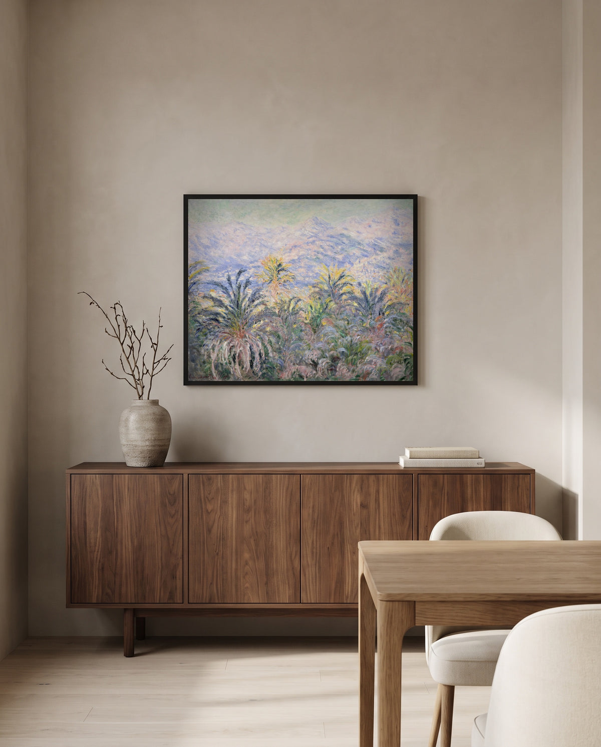 Palm Trees at Bordighera by Claude Monet in a black frame above a walnut sideboard in a dining room