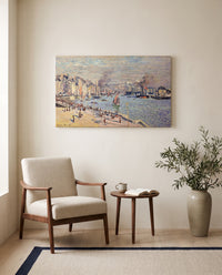 Port of Le Havre by Claude Monet as a stretched canvas above a linen lounge chair in a reading corner