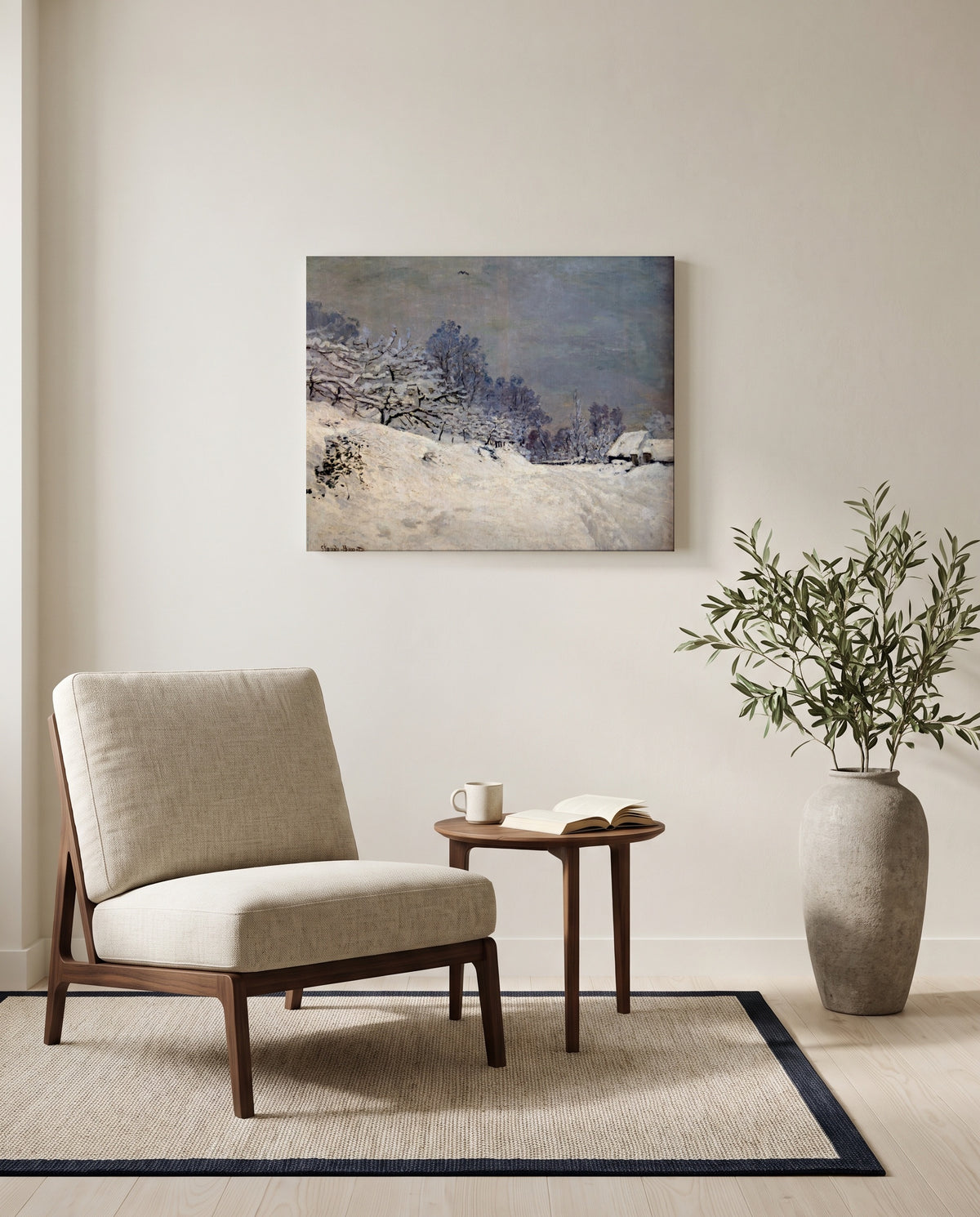 Saint-Siméon Farm in Winter by Claude Monet as a stretched canvas above a linen lounge chair in a reading corner