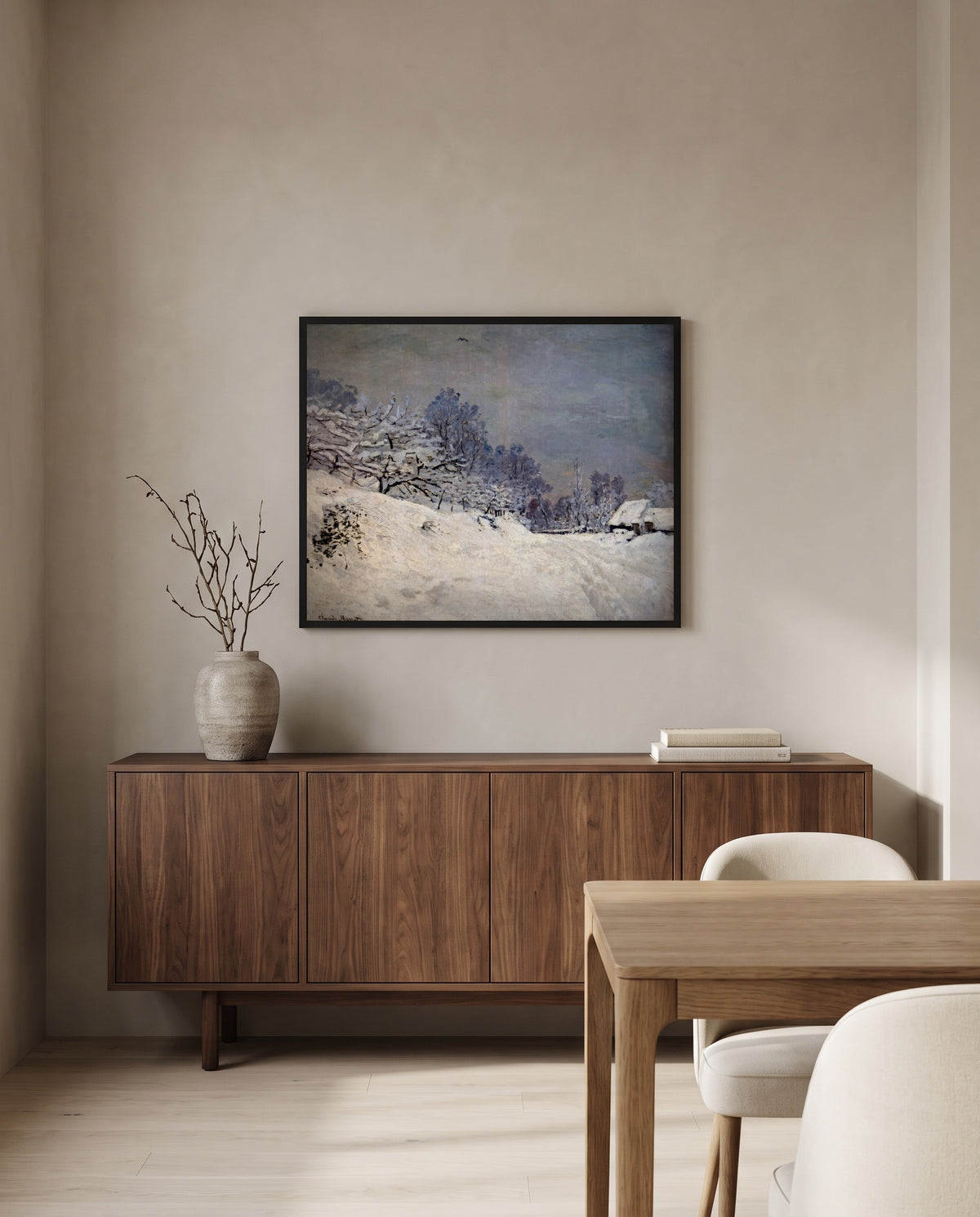 Saint-Siméon Farm in Winter by Claude Monet in a black frame above a walnut sideboard in a dining room