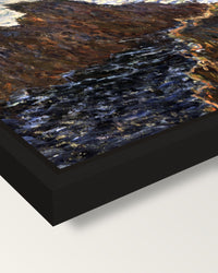 Rocks at Belle-Isle by Claude Monet framed canvas, corner close-up: a black floating frame with a shadow gap round the canvas