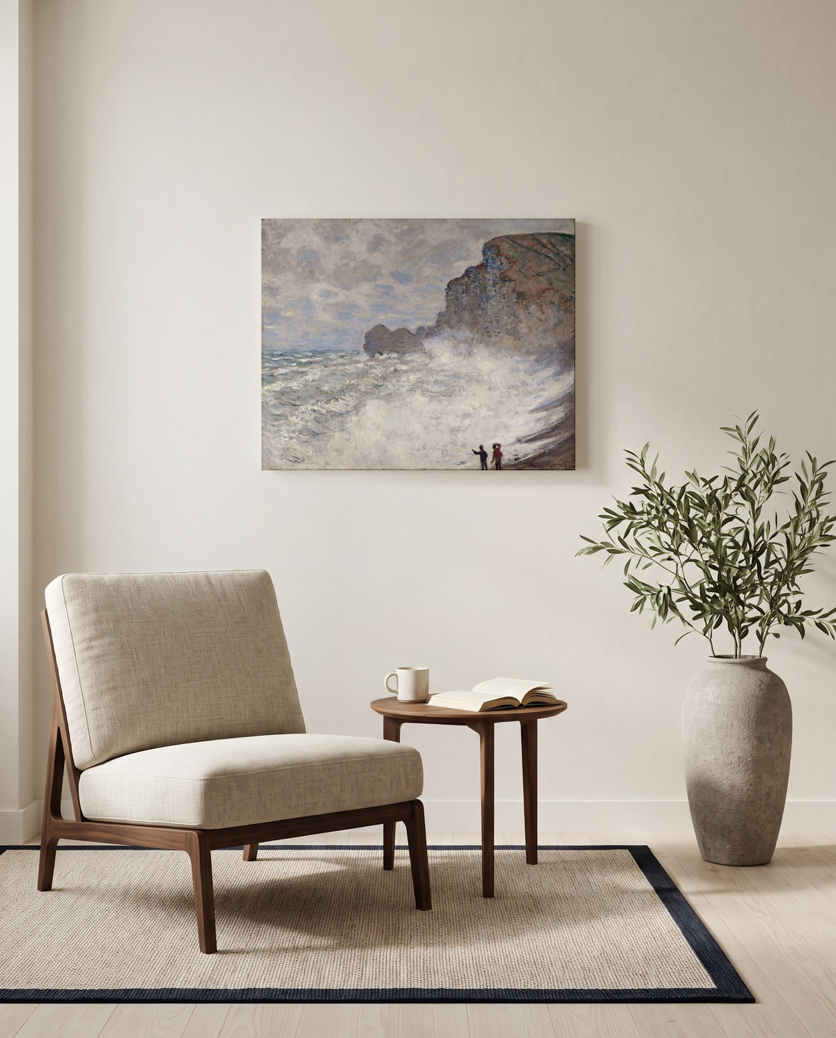 Rough Weather at Étretat by Claude Monet as a stretched canvas above a linen lounge chair in a reading corner