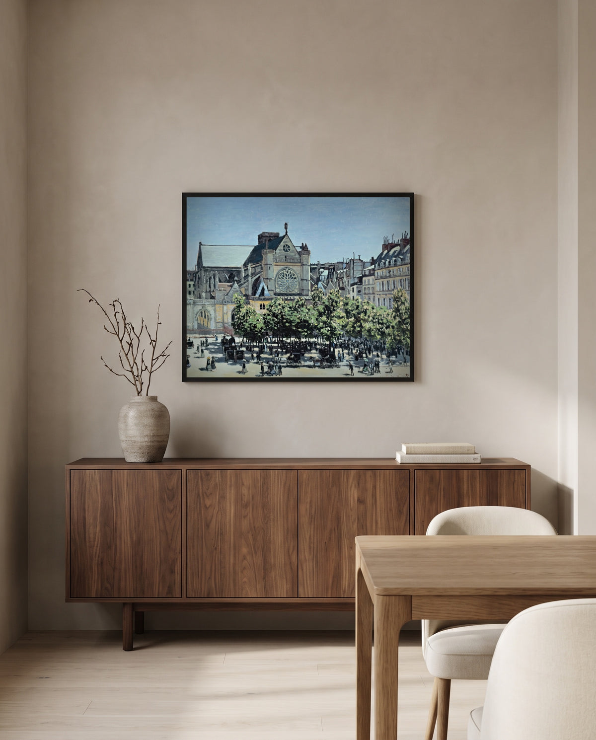 Saint-Germain-l’Auxerrois by Claude Monet in a black frame above a walnut sideboard in a dining room