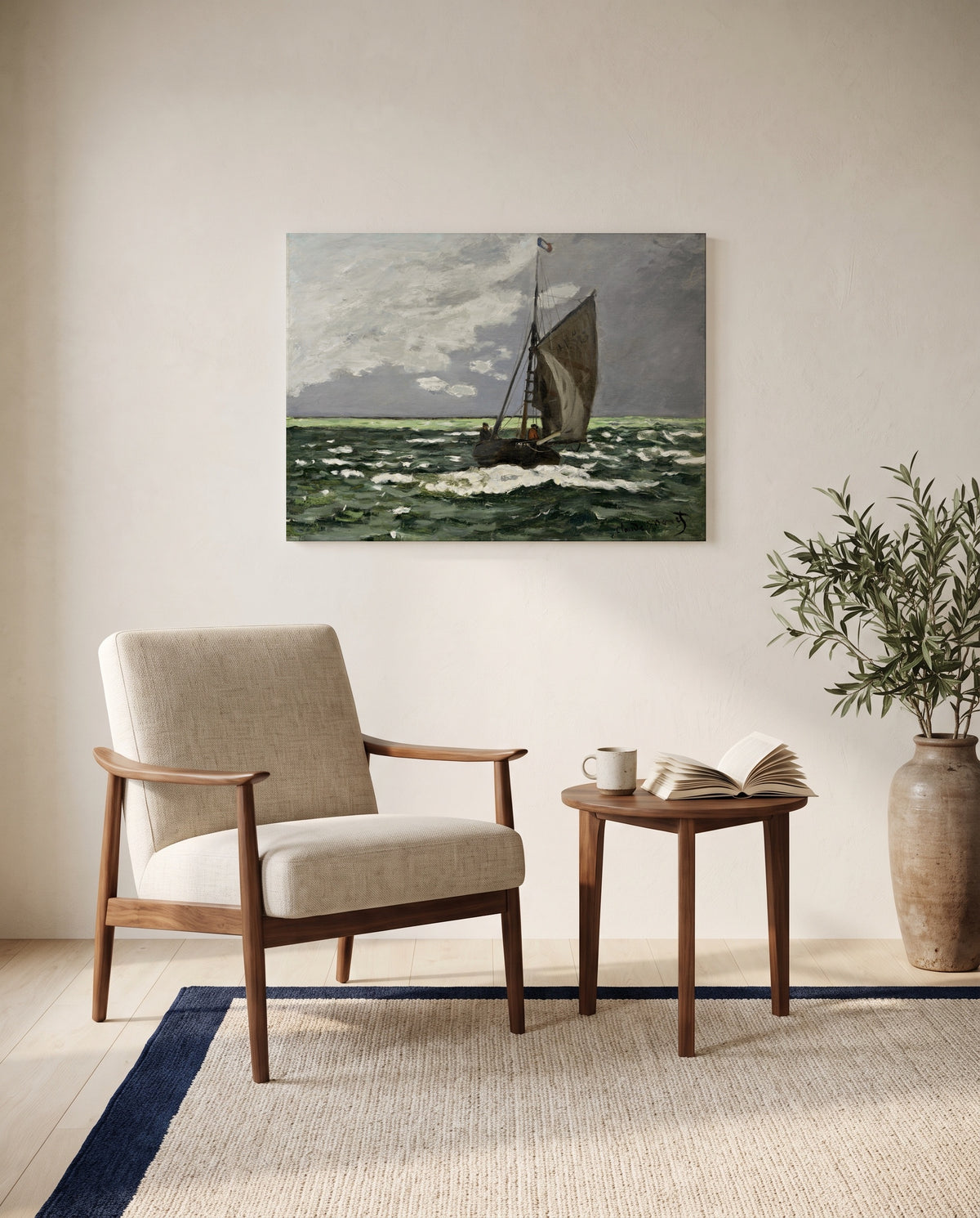 Seascape, Storm by Claude Monet as a stretched canvas above a linen lounge chair in a reading corner