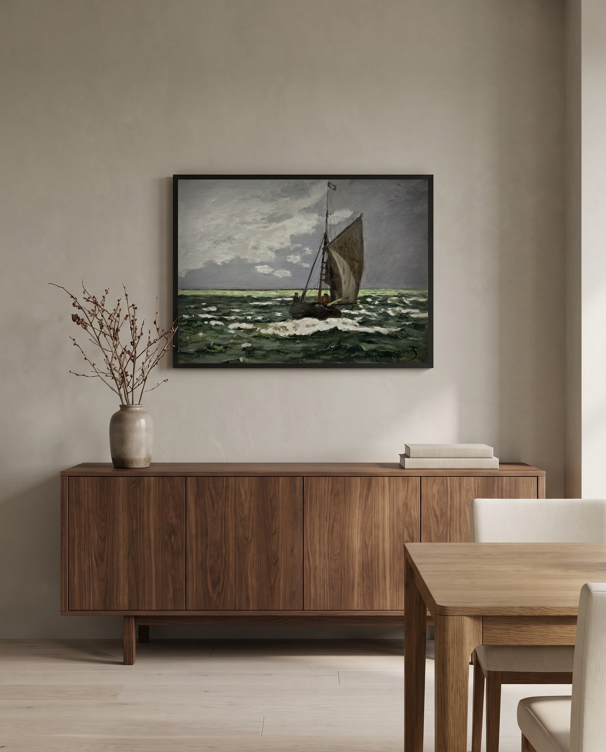 Seascape, Storm by Claude Monet in a black frame above a walnut sideboard in a dining room