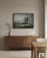 Seascape, Storm by Claude Monet in a black frame above a walnut sideboard in a dining room