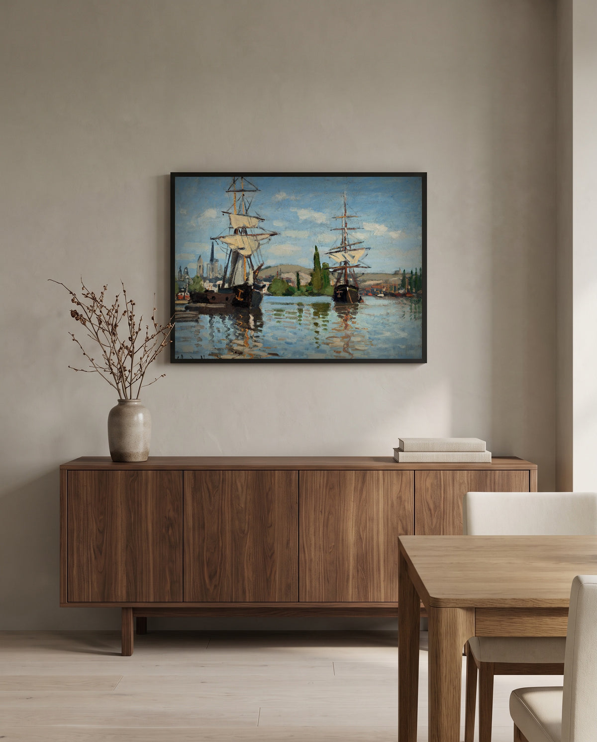 Ships Riding on the Seine at Rouen by Claude Monet in a black frame above a walnut sideboard in a dining room