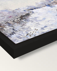 Snow at Argenteuil by Claude Monet framed canvas, corner close-up: a black floating frame with a shadow gap round the canvas