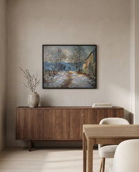 Snow Effect at Limetz by Claude Monet in a black frame above a walnut sideboard in a dining room