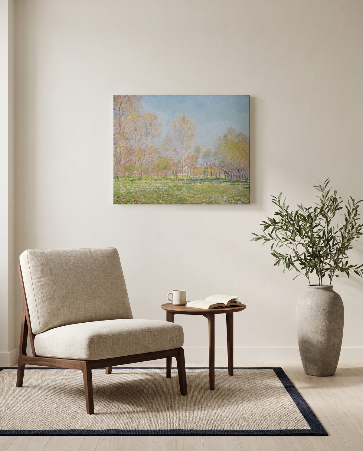 Spring in Giverny by Claude Monet as a stretched canvas above a linen lounge chair in a reading corner
