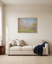 Spring in Giverny by Claude Monet framed in natural oak above a cream sofa in a warm living room