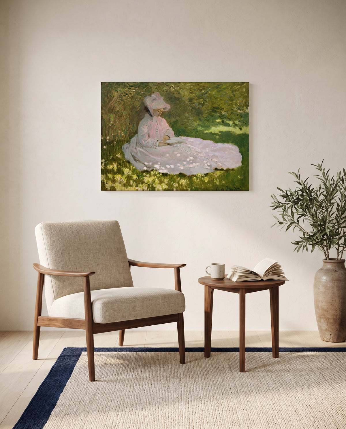 Springtime by Claude Monet as a stretched canvas above a linen lounge chair in a reading corner