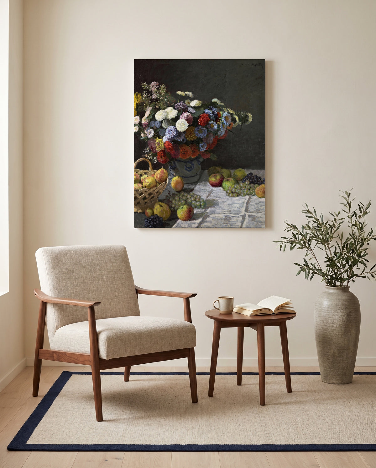 Flowers and Fruit by Claude Monet as a stretched canvas above a linen lounge chair in a reading corner