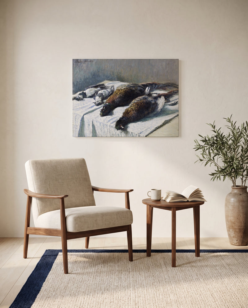 Pheasants and Plovers by Claude Monet as a stretched canvas above a linen lounge chair in a reading corner