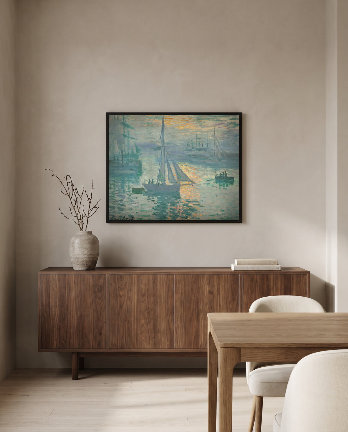 Sunrise (Marine) by Claude Monet in a black frame above a walnut sideboard in a dining room