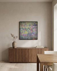 The Artist’s Garden, Giverny by Claude Monet in a black frame above a walnut sideboard in a dining room