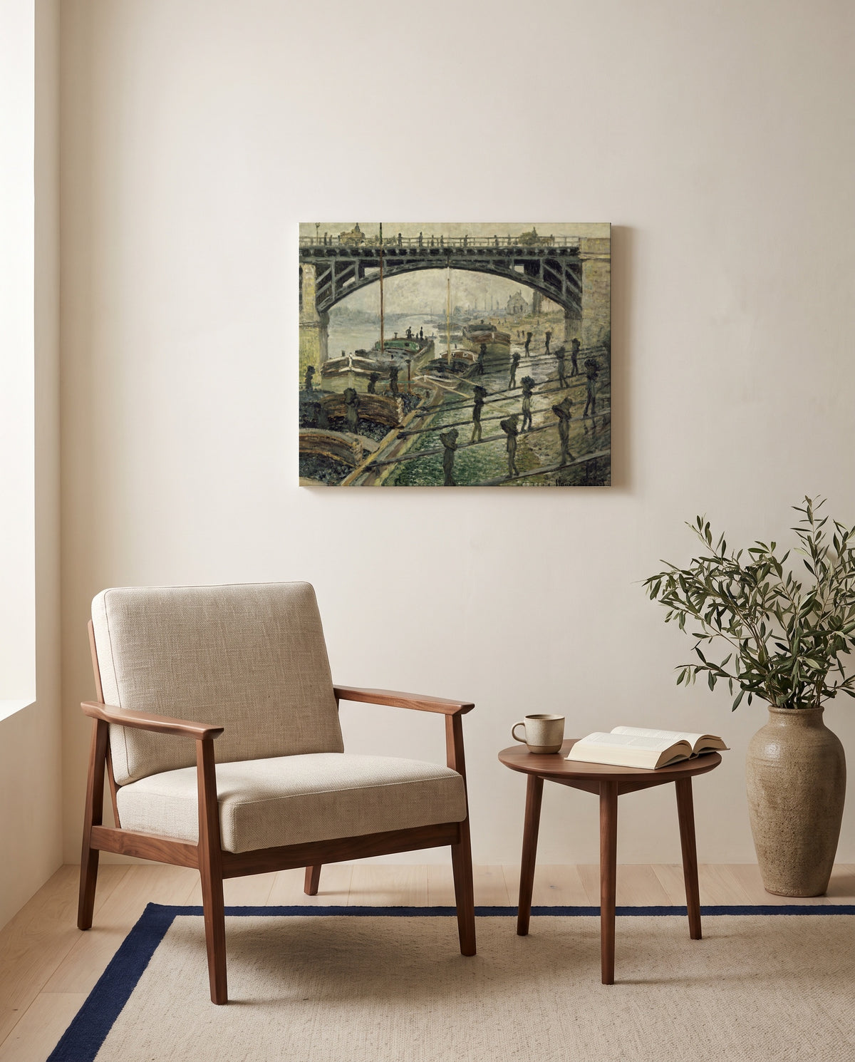 The Coalmen by Claude Monet as a stretched canvas above a linen lounge chair in a reading corner