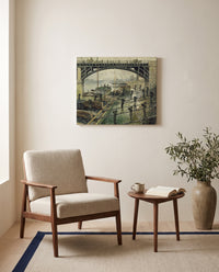 The Coalmen by Claude Monet as a stretched canvas above a linen lounge chair in a reading corner