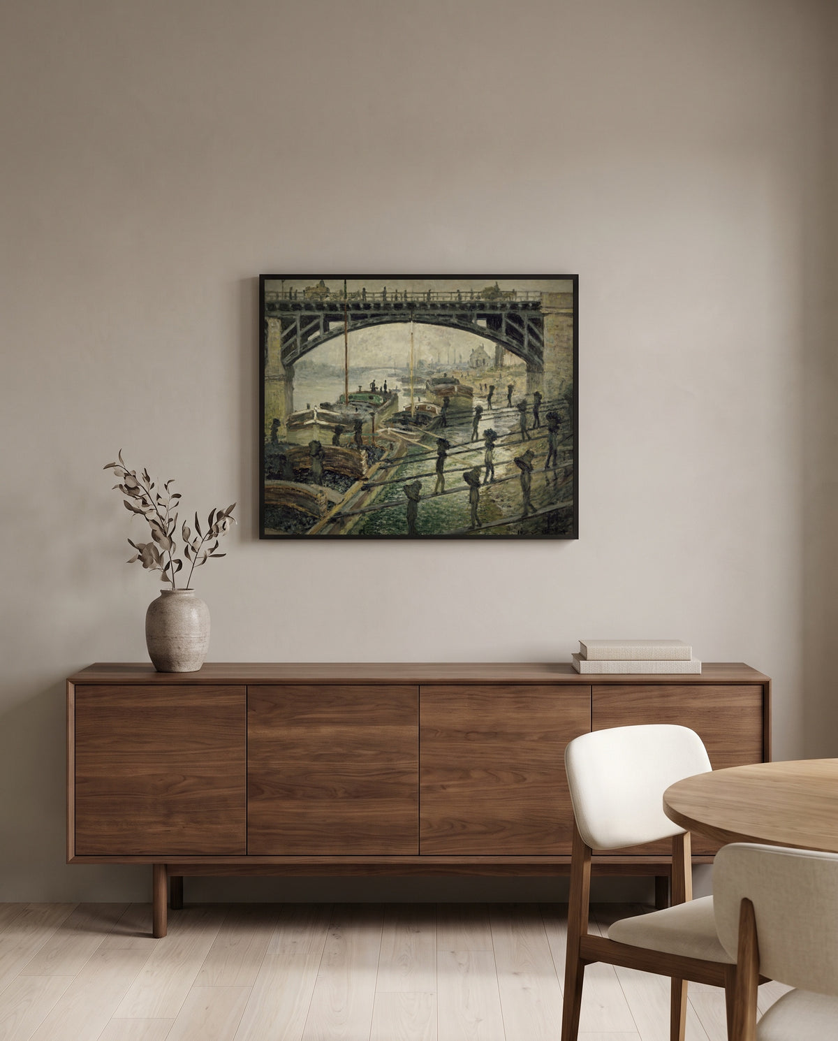 The Coalmen by Claude Monet in a black frame above a walnut sideboard in a dining room