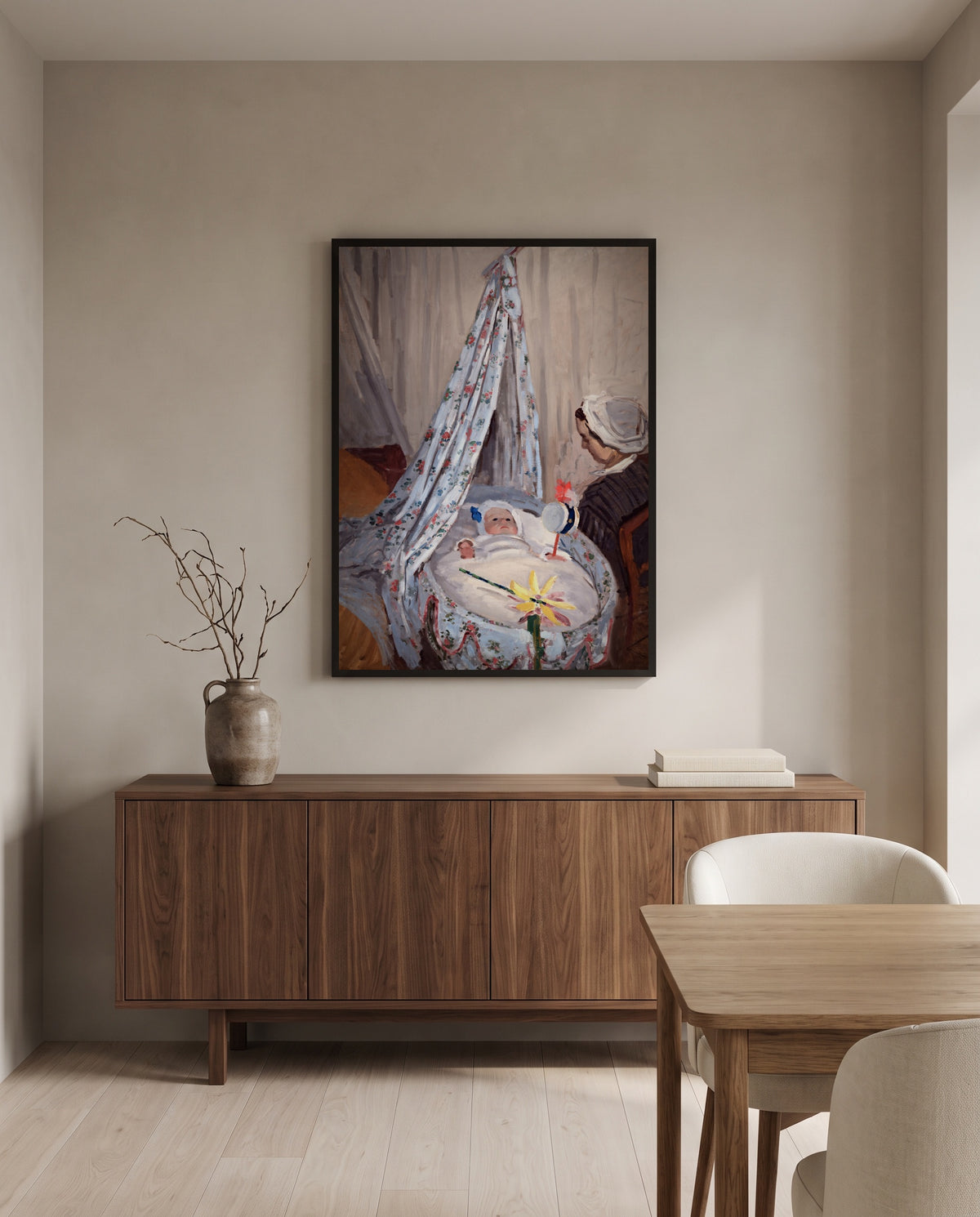 The Cradle by Claude Monet in a black frame above a walnut sideboard in a dining room