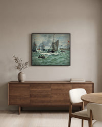 Port of Le Havre Entrance by Claude Monet in a black frame above a walnut sideboard in a dining room