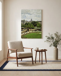 Garden of the Princess by Claude Monet as a stretched canvas above a linen lounge chair in a reading corner