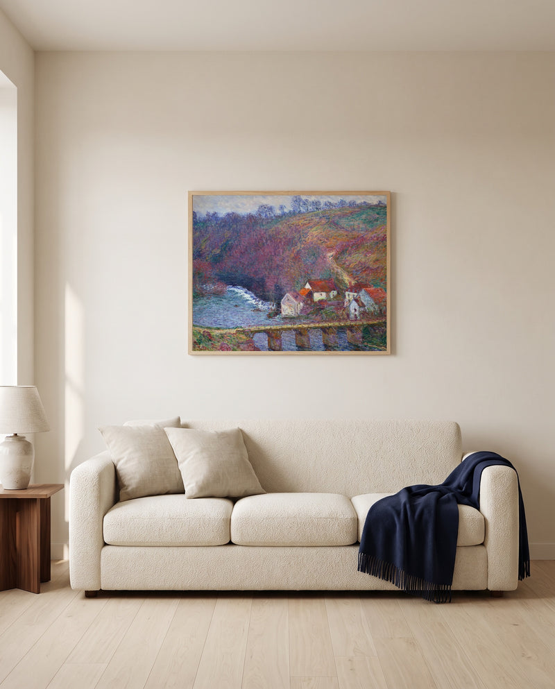 Grande Creuse at Vervy by Claude Monet framed in natural oak above a cream sofa in a warm living room