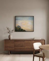 Hut at Trouville by Claude Monet in a black frame above a walnut sideboard in a dining room